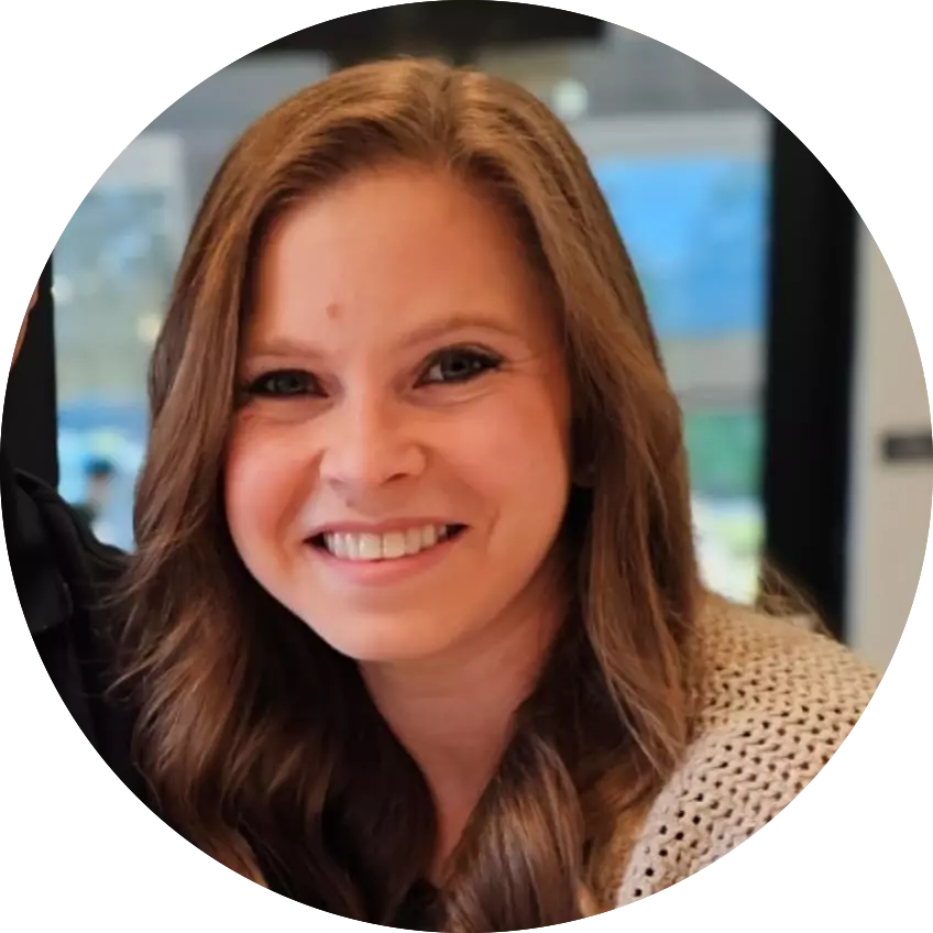 Student and teacher smiling